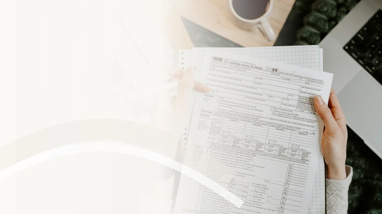 Tax professional reviewing federal tax forms for IRS audit assistance