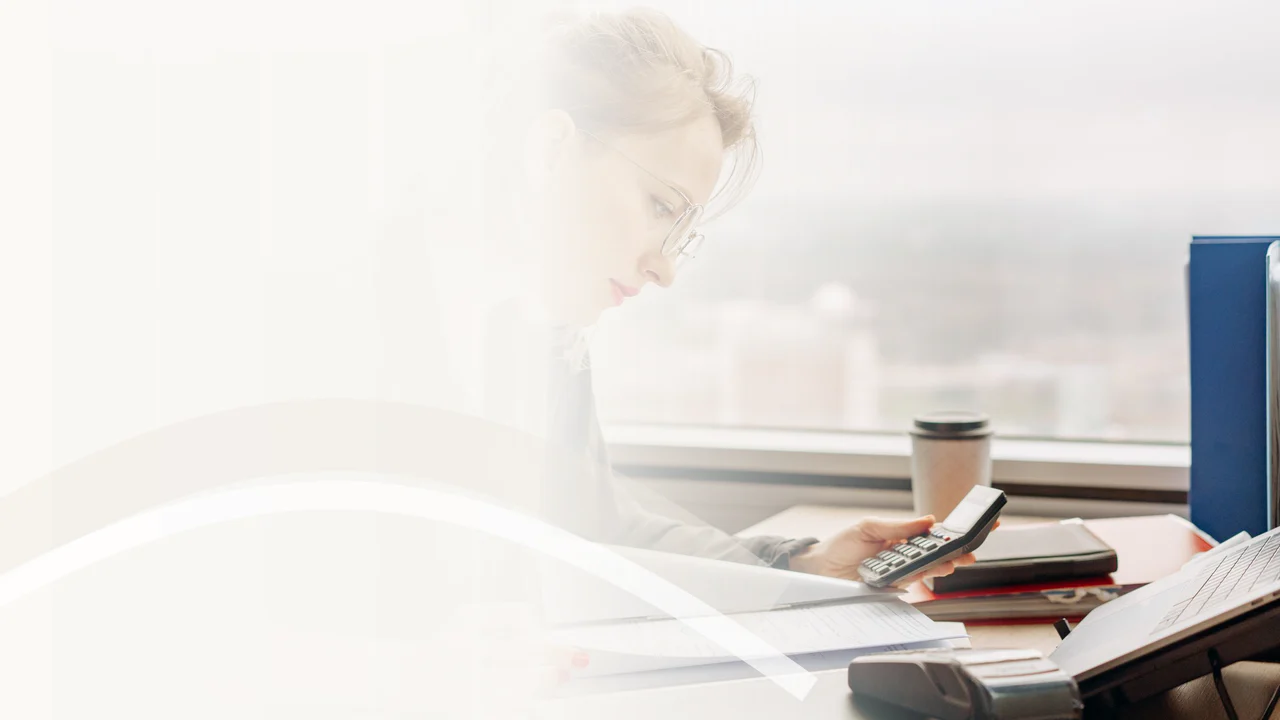 Accounting professional processing payroll records and calculations
