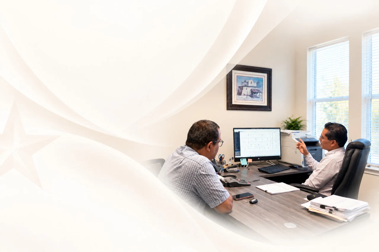 Blue Star tax professional reviewing an individual tax calendar with a client in Austin